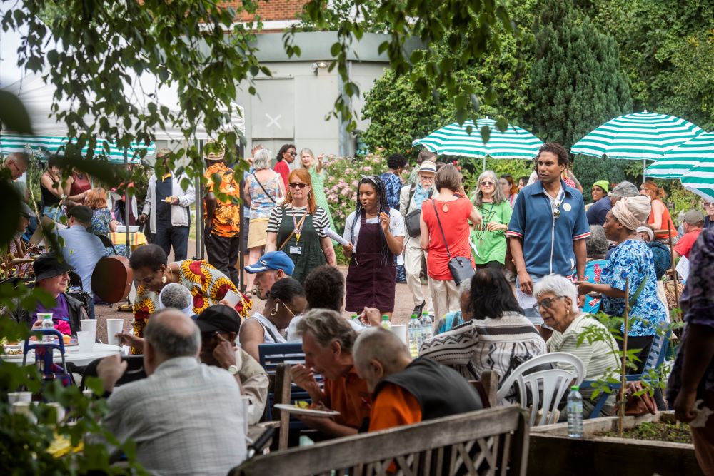 Hackney Circle stand onboarding new members at St Mary's Secret Garden in Hackney